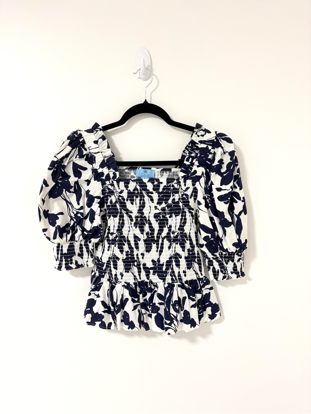 CeCe Navy and White Smocked Puff Sleeve Blouse